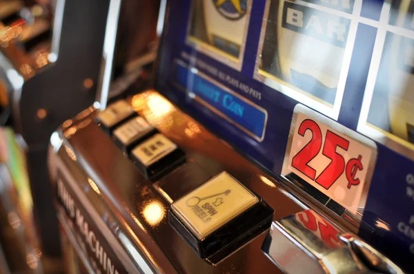 Treasures Aztec five-reel slot display showing temple symbols and payline layout